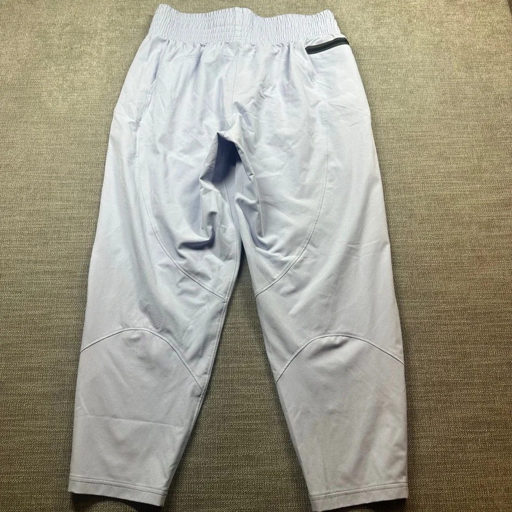 UNDER ARMOUR Women's M Storm Unstoppable Ankle Pants 1382741 539 Purple